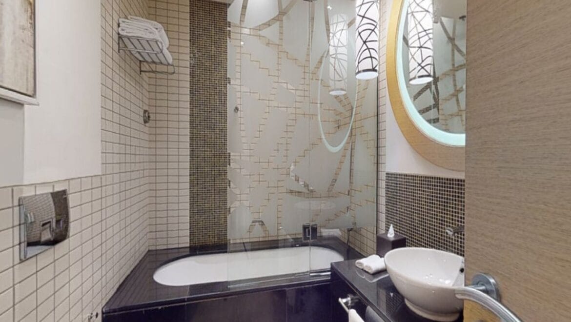 Interior view of a modern 3-bedroom Marriott Executive Apartments in Al Jaddaf, Dubai, featuring a spacious living area and a maid's room.-Propertyana real estate in dubai and sharjeh