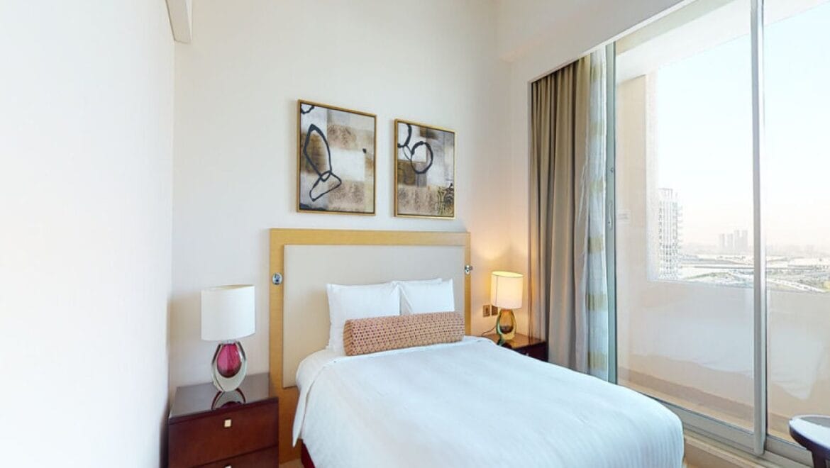 Interior view of a modern 3-bedroom Marriott Executive Apartments in Al Jaddaf, Dubai, featuring a spacious living area and a maid's room.-Propertyana real estate in dubai and sharjeh