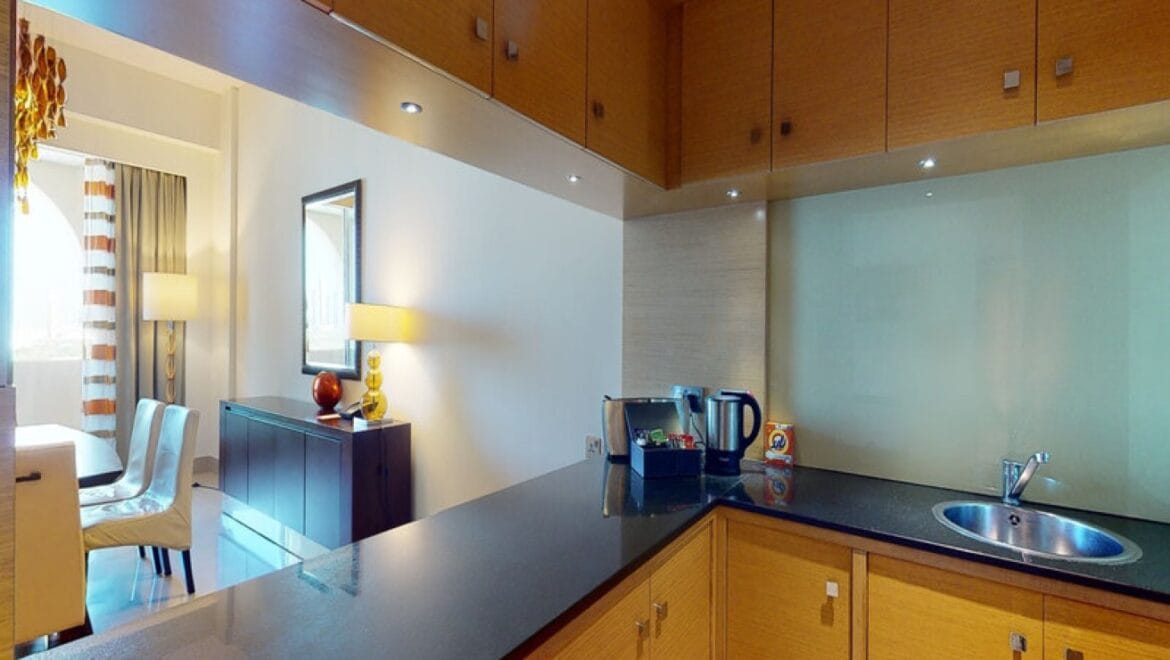 Interior view of a modern 3-bedroom Marriott Executive Apartments in Al Jaddaf, Dubai, featuring a spacious living area and a maid's room.-Propertyana real estate in dubai and sharjeh