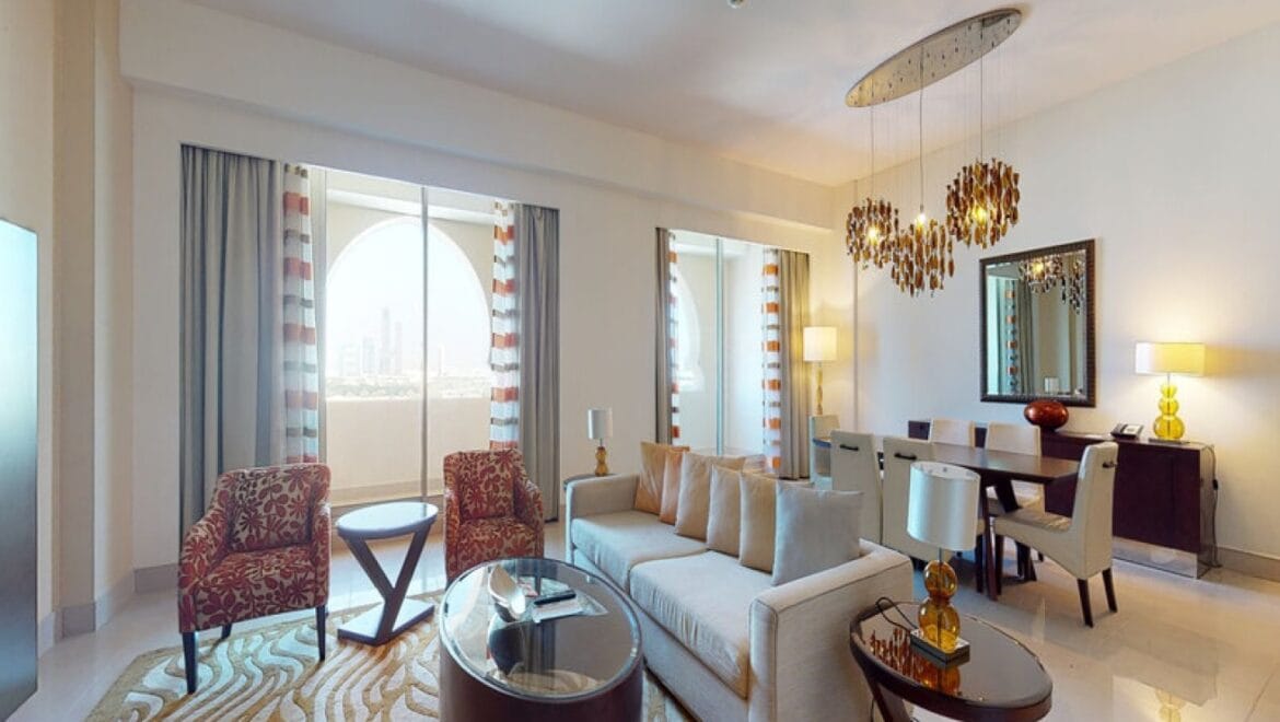 Interior view of a modern 3-bedroom Marriott Executive Apartments in Al Jaddaf, Dubai, featuring a spacious living area and a maid's room.-Propertyana real estate in dubai and sharjeh