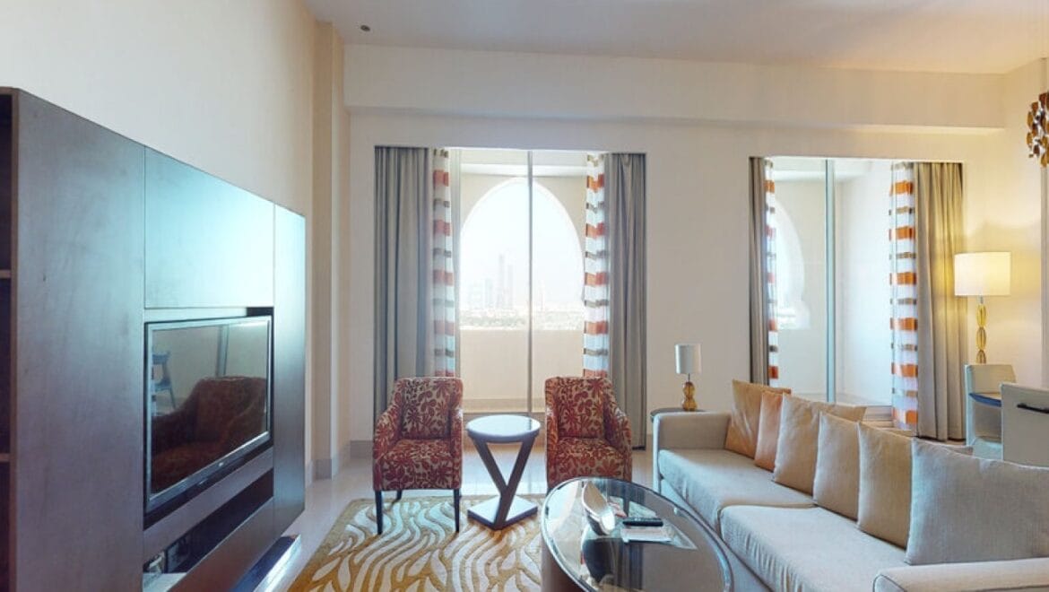 Interior view of a modern 3-bedroom Marriott Executive Apartments in Al Jaddaf, Dubai, featuring a spacious living area and a maid's room.-Propertyana real estate in dubai and sharjeh