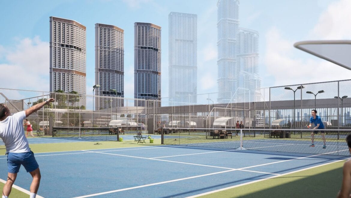 Interior view of a 1-bedroom residential apartment at 340 Riverside Crescent, Dubai (Bukadra), showcasing a modern living area with contemporary furnishings.-Propertyana real estate in dubai and sharjeh