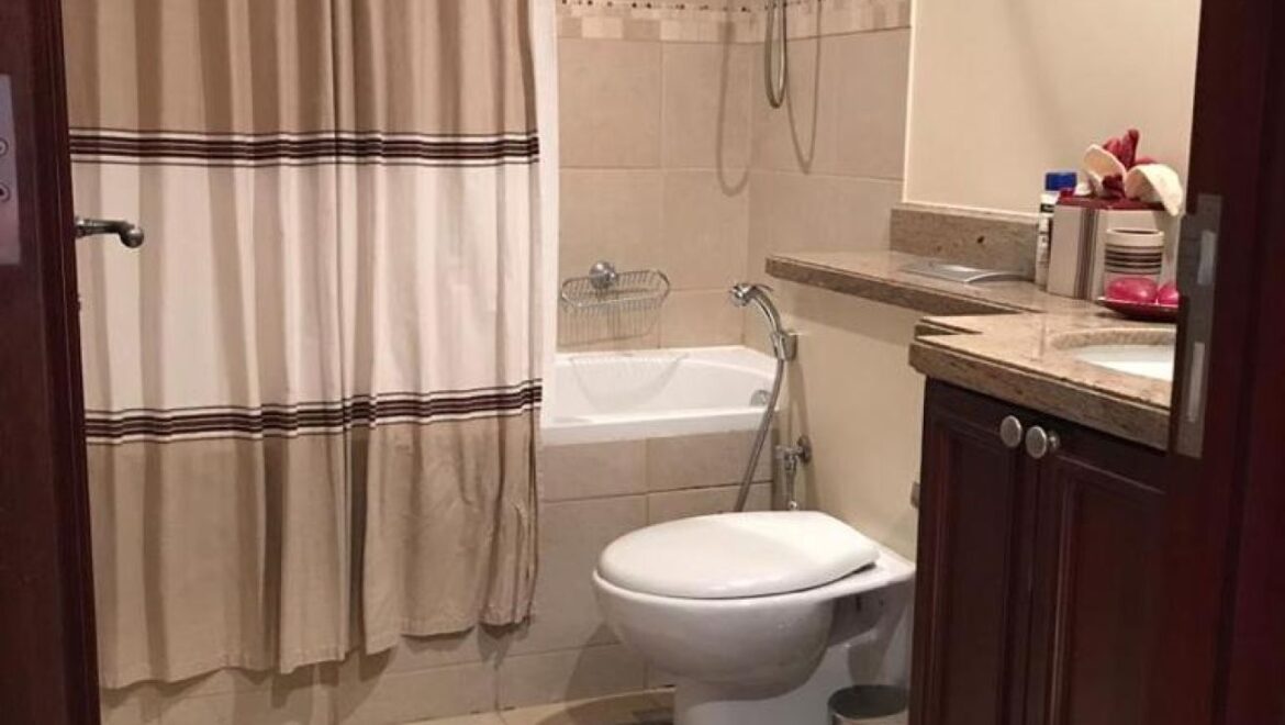 A fully furnished 1-bedroom apartment in Zanzebeel 2, Downtown Dubai, Dubai, featuring a balcony with views of the Burj Khalifa.-Propertyana real estate in dubai and sharjeh