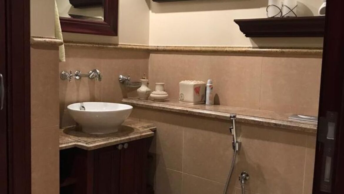 A fully furnished 1-bedroom apartment in Zanzebeel 2, Downtown Dubai, Dubai, featuring a balcony with views of the Burj Khalifa.-Propertyana real estate in dubai and sharjeh