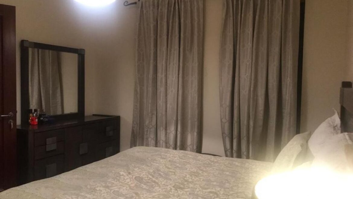 A fully furnished 1-bedroom apartment in Zanzebeel 2, Downtown Dubai, Dubai, featuring a balcony with views of the Burj Khalifa.-Propertyana real estate in dubai and sharjeh