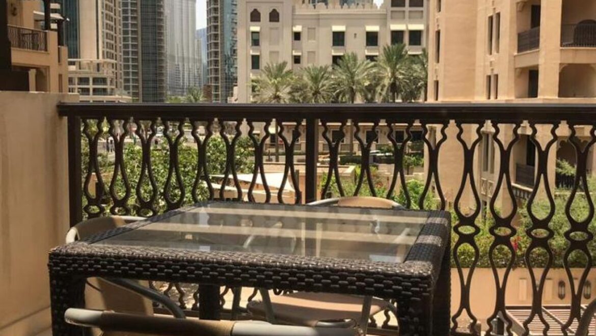 A fully furnished 1-bedroom apartment in Zanzebeel 2, Downtown Dubai, Dubai, featuring a balcony with views of the Burj Khalifa.-Propertyana real estate in dubai and sharjeh
