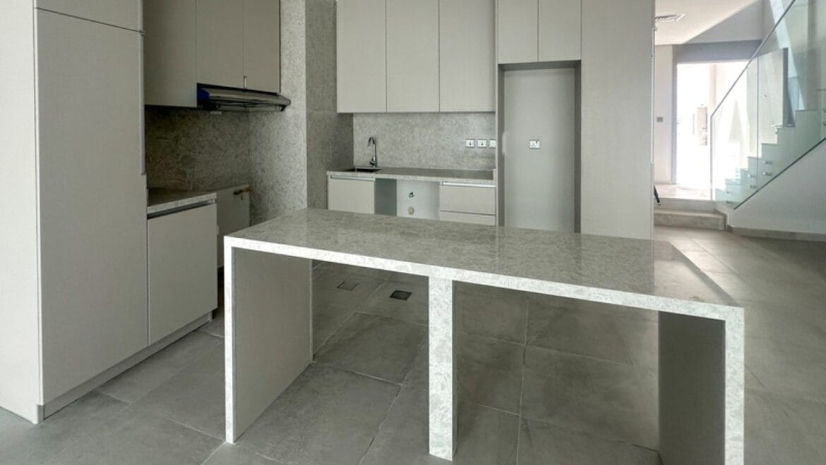 Exterior view of a modern three-bedroom townhouse in MAG Eye, Mohammed Bin Rashid City, Dubai; unfurnished.-Propertyana real estate in dubai and sharjeh