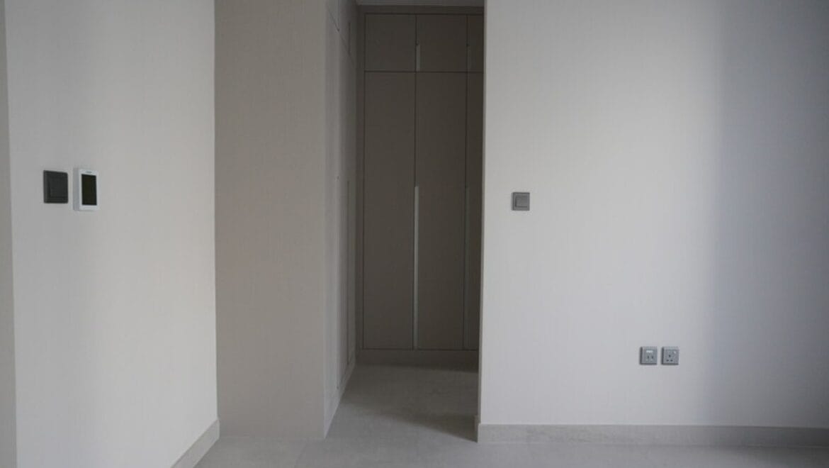 Exterior view of a modern three-bedroom townhouse in MAG Eye, Mohammed Bin Rashid City, Dubai; unfurnished.-Propertyana real estate in dubai and sharjeh