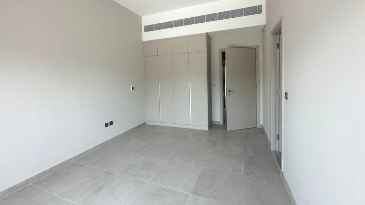 Exterior view of a modern three-bedroom townhouse in MAG Eye, Mohammed Bin Rashid City, Dubai; unfurnished.-Propertyana real estate in dubai and sharjeh