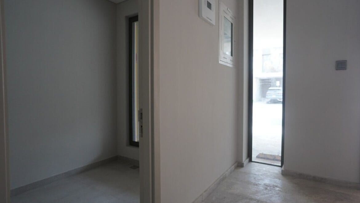 Exterior view of a modern three-bedroom townhouse in MAG Eye, Mohammed Bin Rashid City, Dubai; unfurnished.-Propertyana real estate in dubai and sharjeh