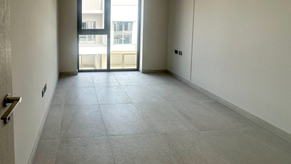 Exterior view of a modern three-bedroom townhouse in MAG Eye, Mohammed Bin Rashid City, Dubai; unfurnished.-Propertyana real estate in dubai and sharjeh