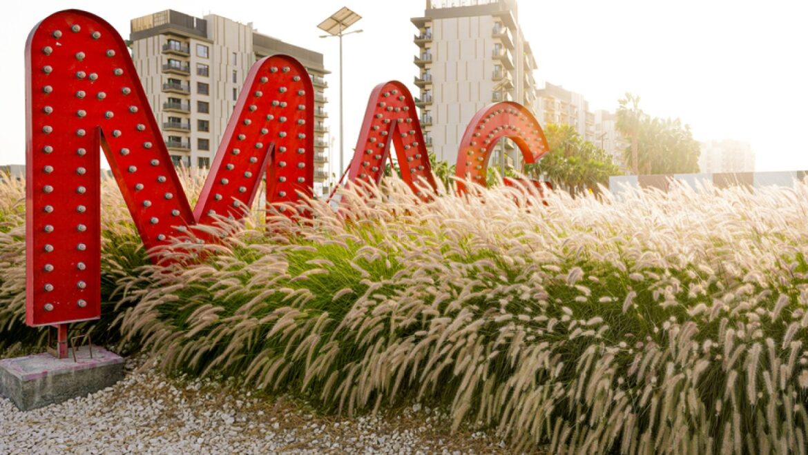 Exterior view of a modern three-bedroom townhouse in MAG Eye, Mohammed Bin Rashid City, Dubai; unfurnished.-Propertyana real estate in dubai and sharjeh