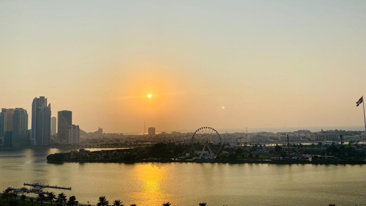 Interior view of a luxury 3-bedroom apartment in Al Majaz 1, Sharjah, featuring a spacious living area with modern furnishings and expansive sea-facing windows.-Propertyana real estate in dubai and sharjeh