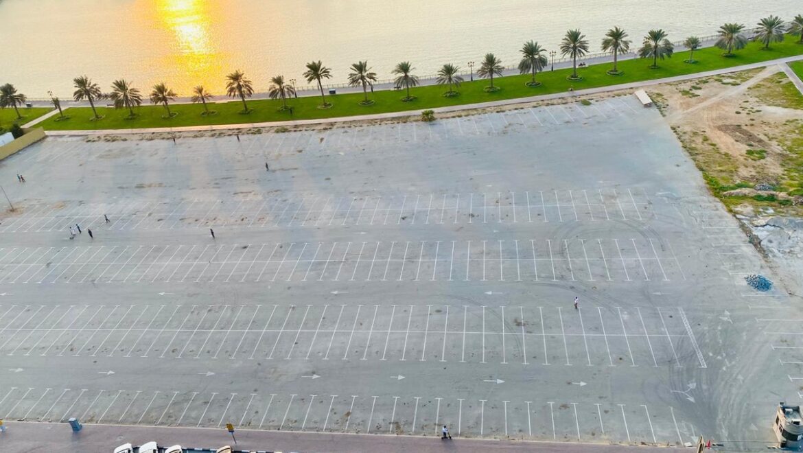 Interior view of a luxury 3-bedroom apartment in Al Majaz 1, Sharjah, featuring a spacious living area with modern furnishings and expansive sea-facing windows.-Propertyana real estate in dubai and sharjeh