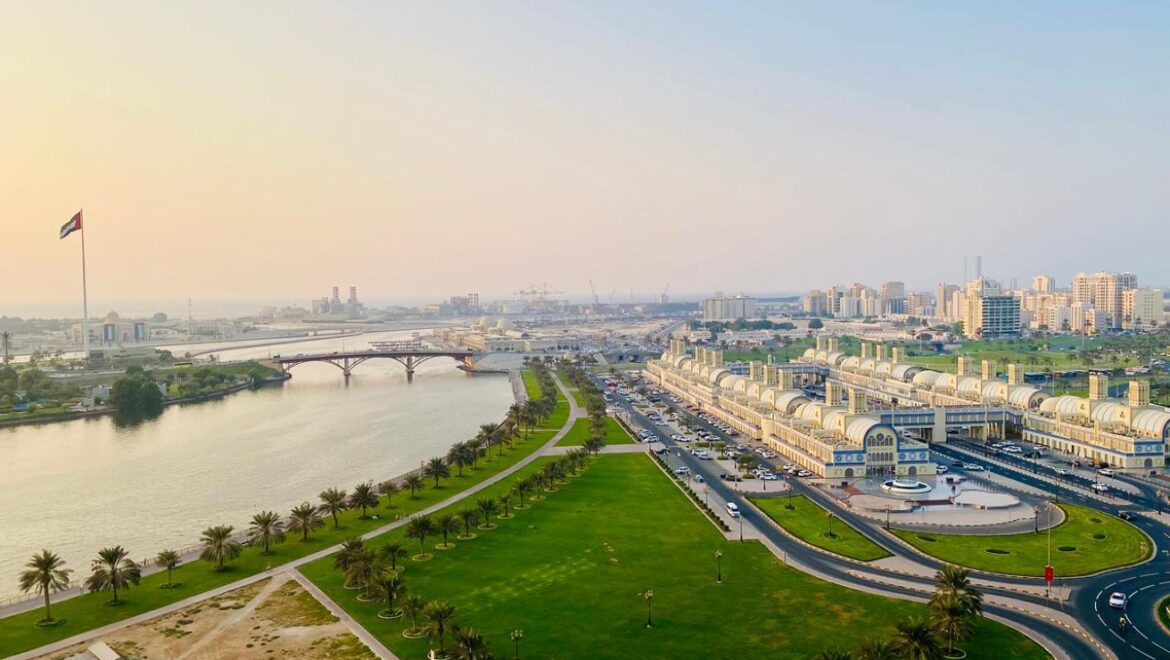 Interior view of a luxury 3-bedroom apartment in Al Majaz 1, Sharjah, featuring a spacious living area with modern furnishings and expansive sea-facing windows.-Propertyana real estate in dubai and sharjeh