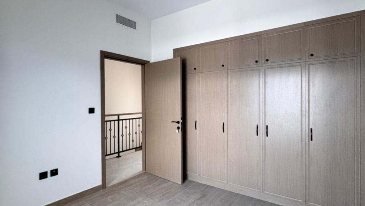 Exterior view of a luxury 3-bedroom townhouse in Santorini at Damac Lagoons, Dubai, residential community.-Propertyana real estate in dubai and sharjeh