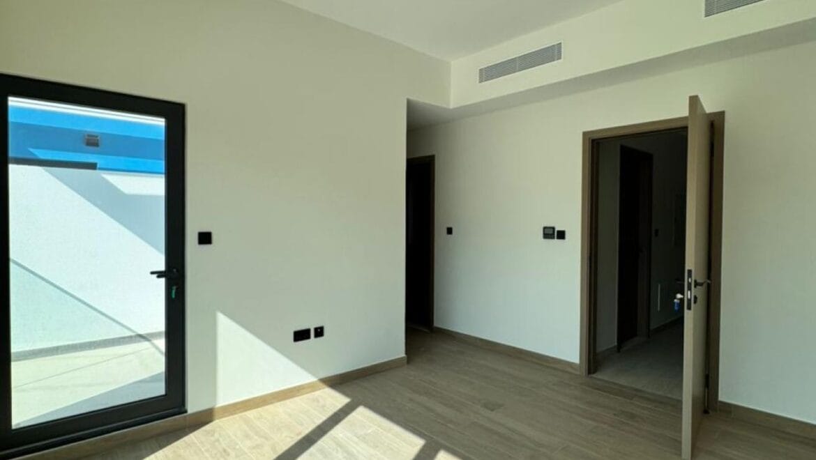 Exterior view of a luxury 3-bedroom townhouse in Santorini at Damac Lagoons, Dubai, residential community.-Propertyana real estate in dubai and sharjeh