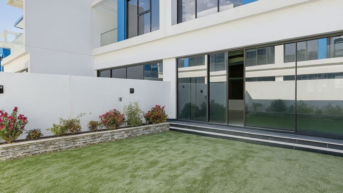 Exterior view of a luxury 3-bedroom townhouse in Santorini at Damac Lagoons, Dubai, residential community.-Propertyana real estate in dubai and sharjeh