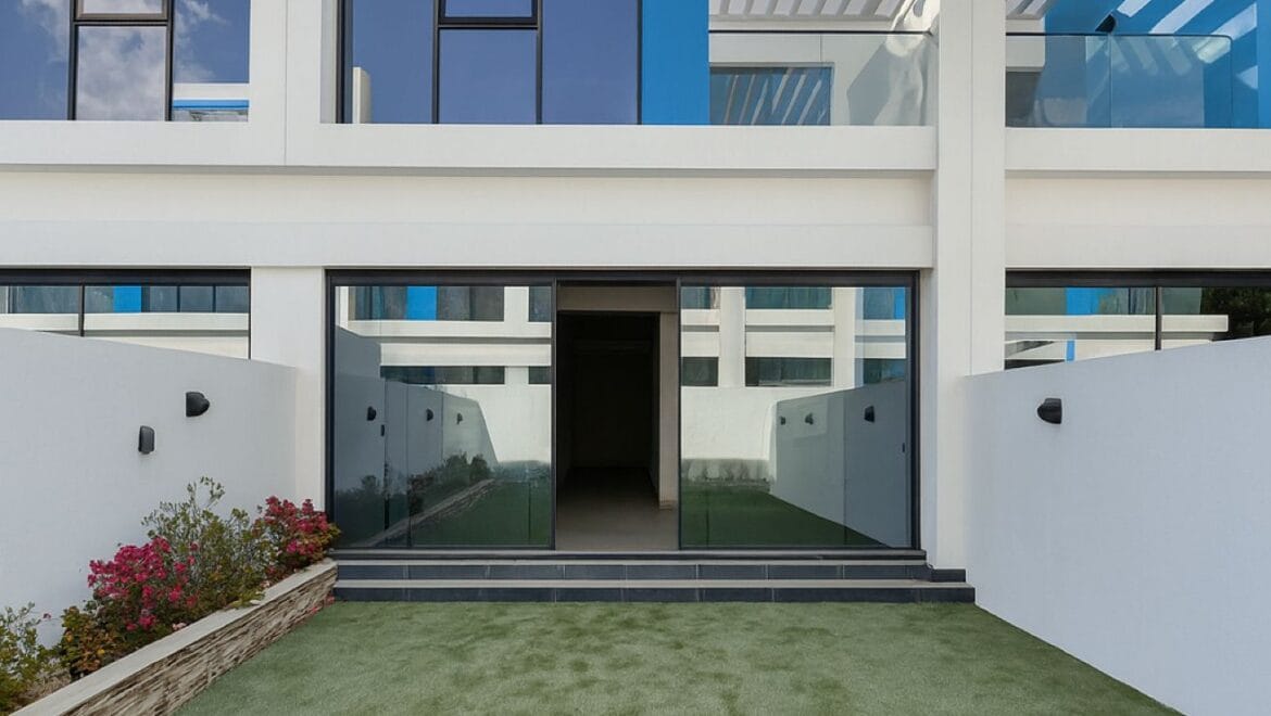 Exterior view of a luxury 3-bedroom townhouse in Santorini at Damac Lagoons, Dubai, residential community.-Propertyana real estate in dubai and sharjeh