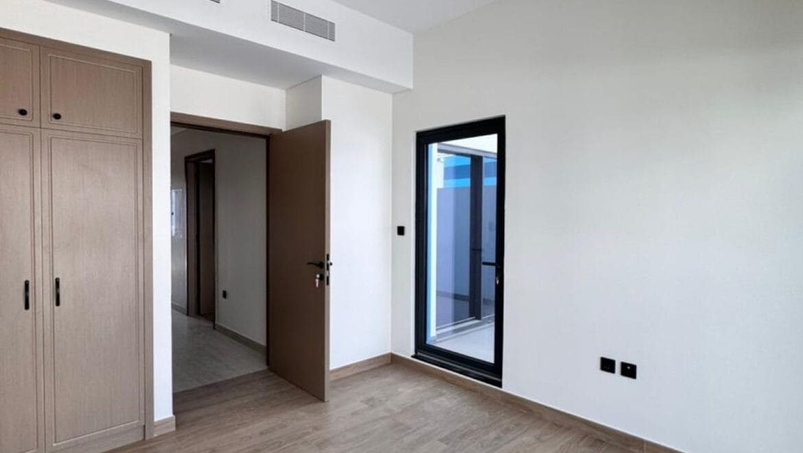 Exterior view of a luxury 3-bedroom townhouse in Santorini at Damac Lagoons, Dubai, residential community.-Propertyana real estate in dubai and sharjeh