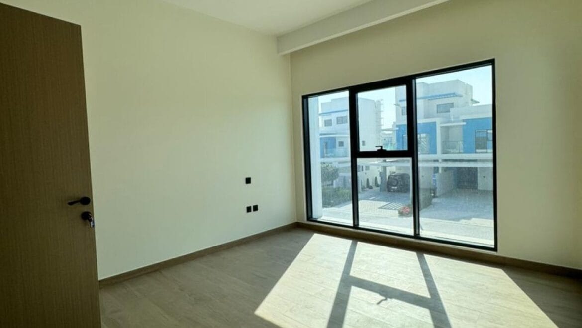 Exterior view of a luxury 3-bedroom townhouse in Santorini at Damac Lagoons, Dubai, residential community.-Propertyana real estate in dubai and sharjeh