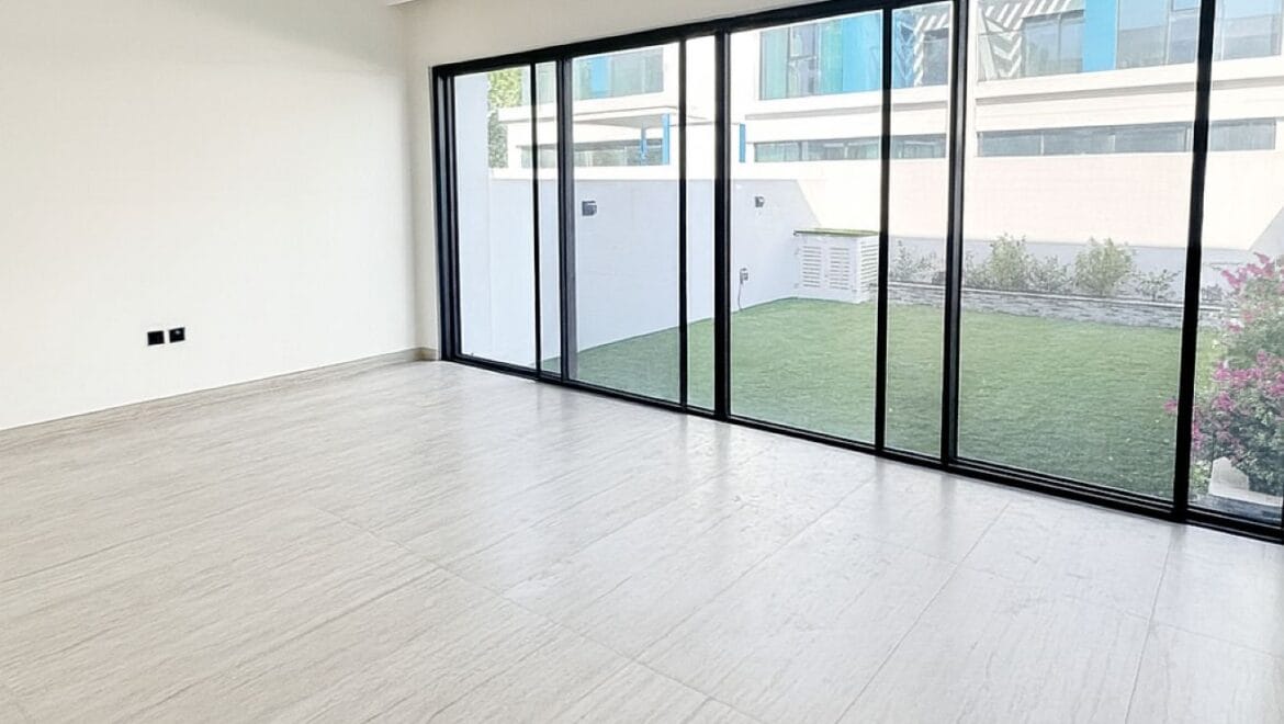 Exterior view of a luxury 3-bedroom townhouse in Santorini at Damac Lagoons, Dubai, residential community.-Propertyana real estate in dubai and sharjeh