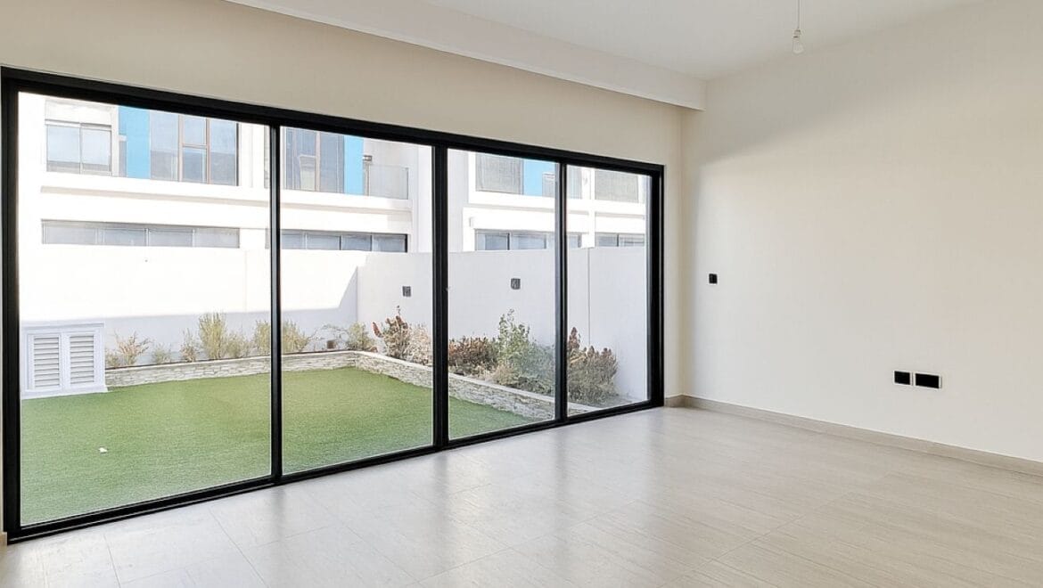 Exterior view of a luxury 3-bedroom townhouse in Santorini at Damac Lagoons, Dubai, residential community.-Propertyana real estate in dubai and sharjeh