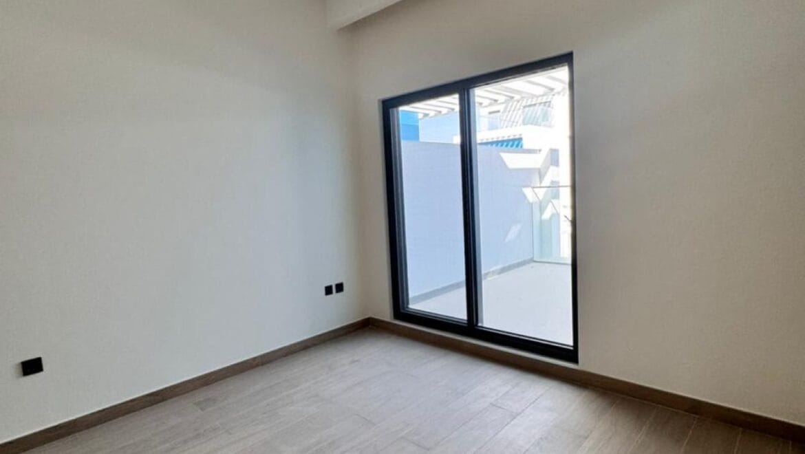 Exterior view of a luxury 3-bedroom townhouse in Santorini at Damac Lagoons, Dubai, residential community.-Propertyana real estate in dubai and sharjeh