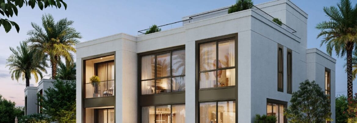 Front facade of a luxury 4-bedroom villa at Address Villas Tierra in The Oasis by Emaar, Dubai, featuring modern architecture, floor-to-ceiling windows, and a landscaped outdoor space.-Propertyana real estate in dubai and sharjeh