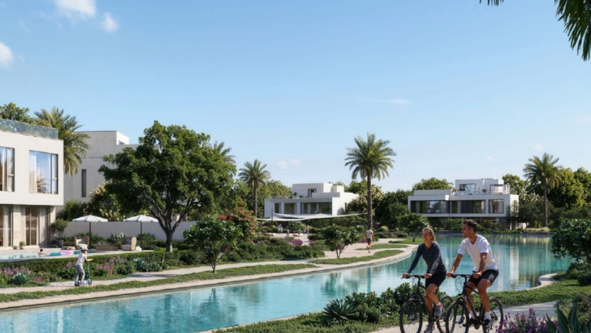 Front facade of a luxury 4-bedroom villa at Address Villas Tierra in The Oasis by Emaar, Dubai, featuring modern architecture, floor-to-ceiling windows, and a landscaped outdoor space.-Propertyana real estate in dubai and sharjeh