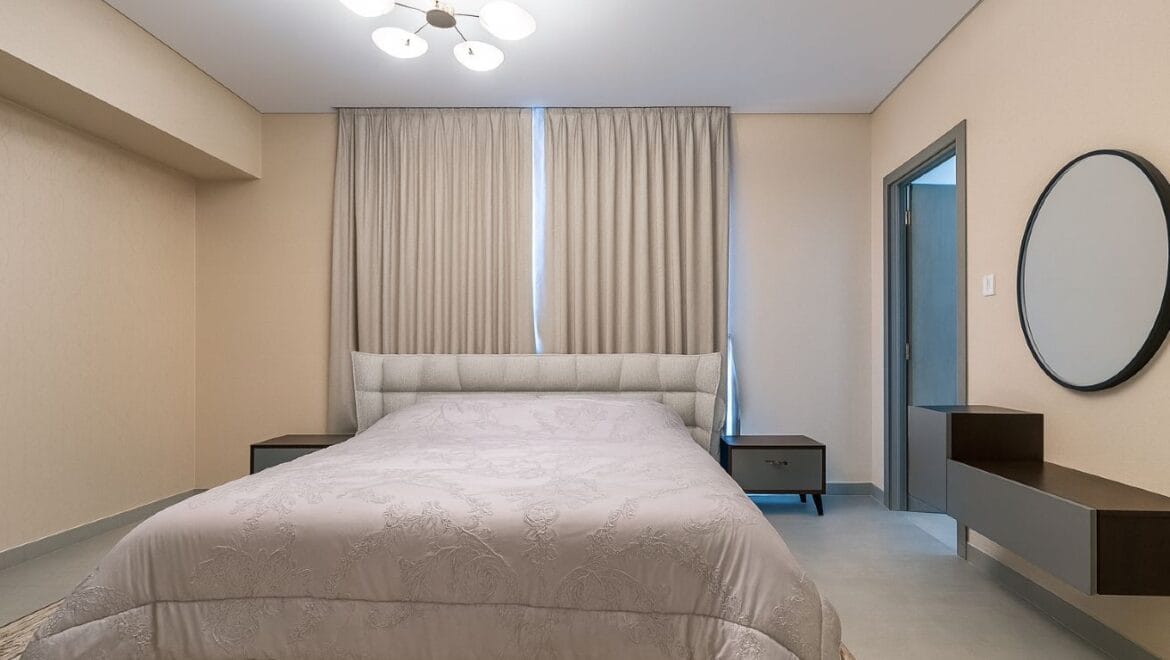 Exterior view of a modern, upgraded 4-bedroom waterfront townhouse in Ajmal Makan City within Sharjah Waterfront City, featuring private beach access.-Propertyana real estate in dubai and sharjeh