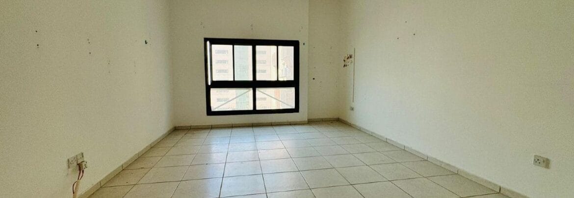Interior view of a spacious one-bedroom apartment in SG Al Soor Building, Al Soor Complex, Al Qasimia, Sharjah, UAE (Chiller-free).-Propertyana real estate in dubai and sharjeh