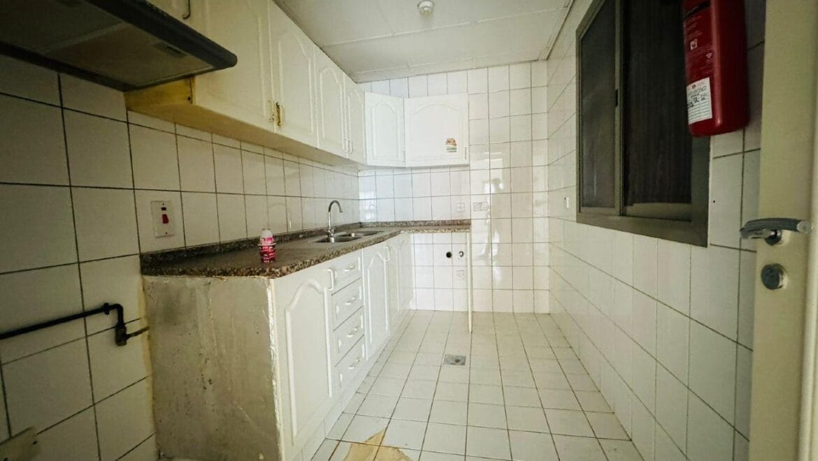 Interior view of a spacious one-bedroom apartment in SG Al Soor Building, Al Soor Complex, Al Qasimia, Sharjah, UAE (Chiller-free).-Propertyana real estate in dubai and sharjeh