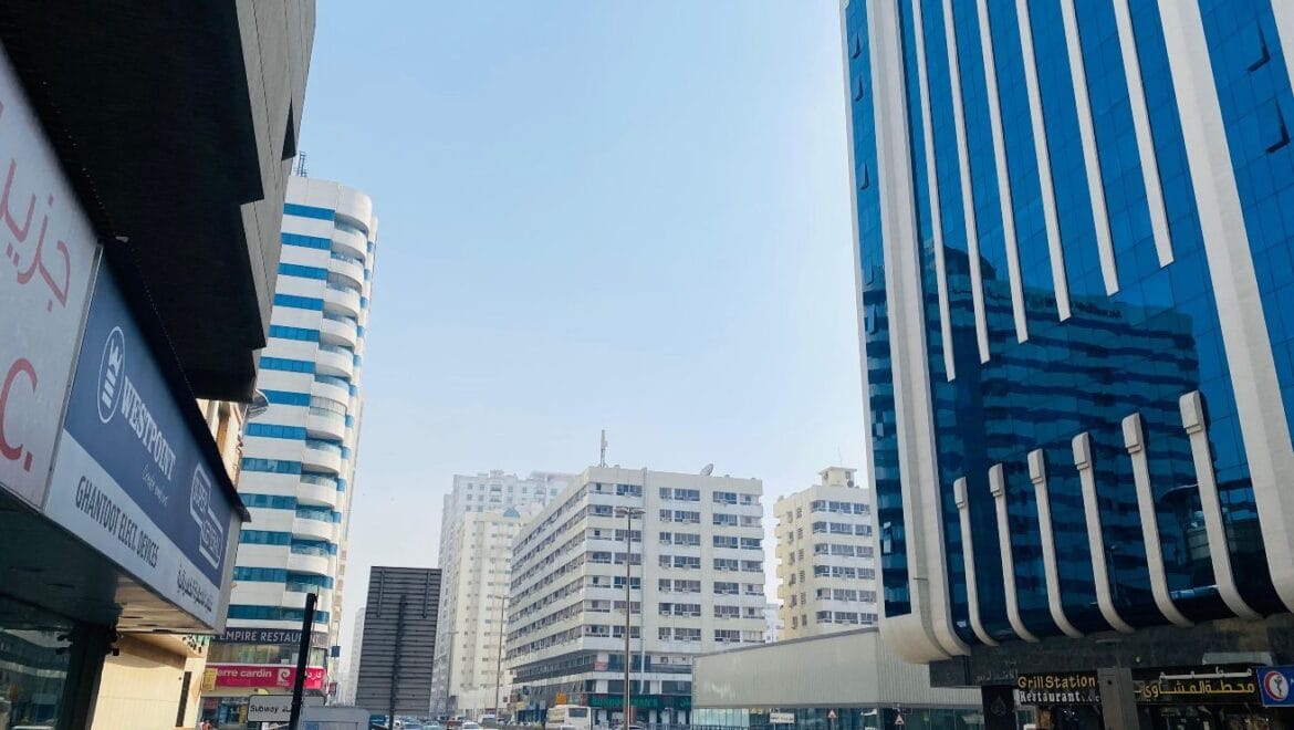 Interior view of a modern bedroom showroom inside a commercial retail space in Al Nabba, Sharjah, featuring a neatly made bed, neutral tones, and contemporary furnishings.-Propertyana real estate in dubai and sharjeh