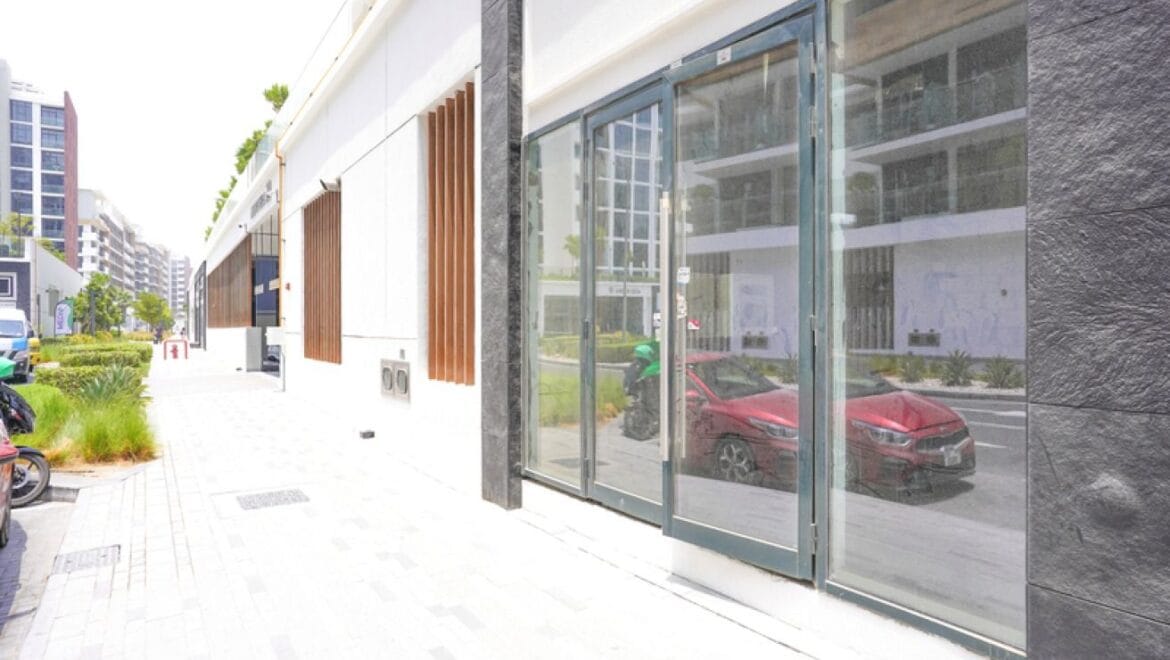 Interior of a bedroom-style showroom in a retail space at Azizi Riviera 20, Meydan, Dubai, showcasing modern furnishings.-Propertyana real estate in dubai and sharjeh