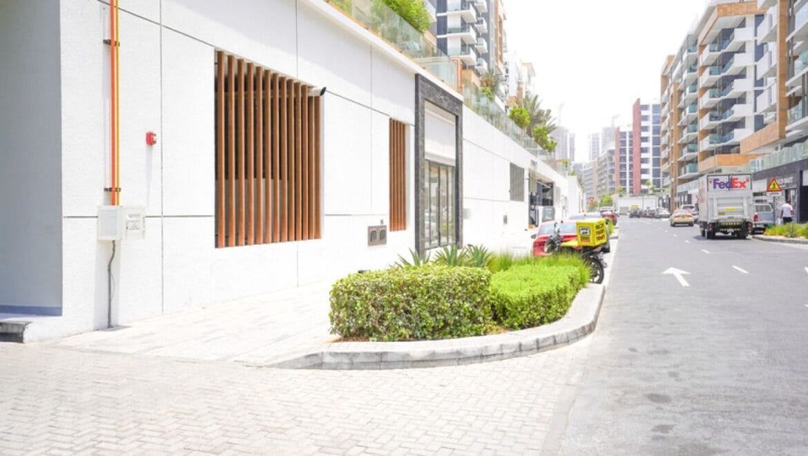 Interior of a bedroom-style showroom in a retail space at Azizi Riviera 20, Meydan, Dubai, showcasing modern furnishings.-Propertyana real estate in dubai and sharjeh