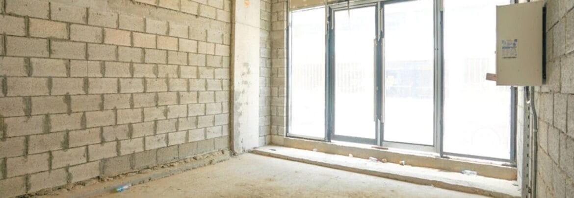 Interior of a bedroom-style showroom in a retail space at Azizi Riviera 20, Meydan, Dubai, showcasing modern furnishings.-Propertyana real estate in dubai and sharjeh