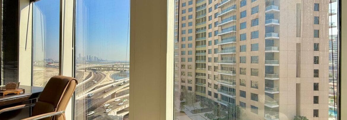 Bedroom interior at Crystal Tower, Business Bay, Dubai, with canal view-Propertyana real estate in dubai and sharjeh