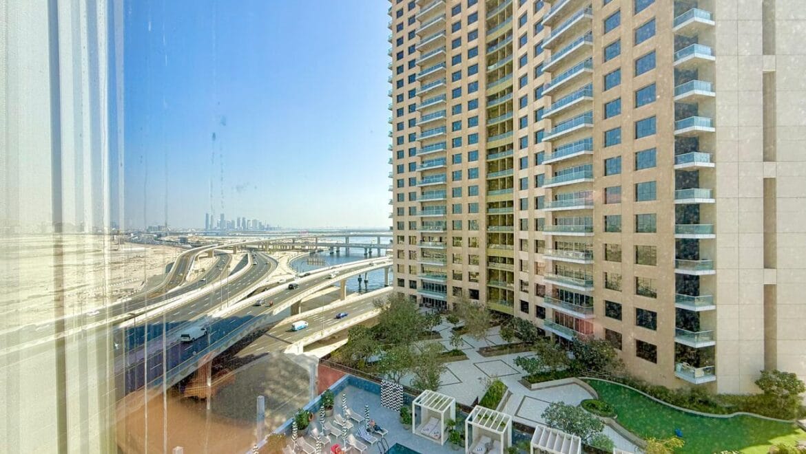 Bedroom interior at Crystal Tower, Business Bay, Dubai, with canal view-Propertyana real estate in dubai and sharjeh