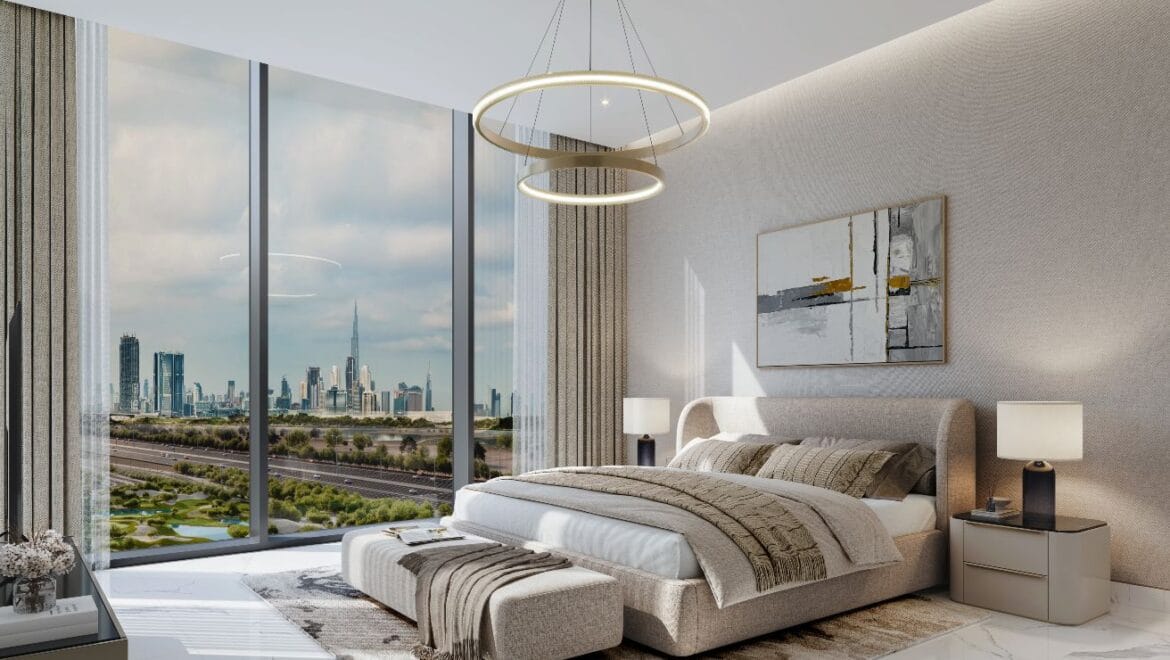 Interior view of a luxury 3-bedroom apartment in The Element at Sobha One, Dubai, featuring an open-plan living area, modern furnishings, premium finishes, and floor-to-ceiling windows with city views.-Propertyana real estate in dubai and sharjeh