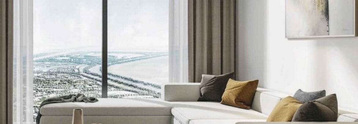 Interior of a 1-bedroom apartment on a high floor at Sobha Orbis Tower C, Motor City, Dubai, featuring an open-plan living area and modern finishes.-Propertyana real estate in dubai and sharjeh