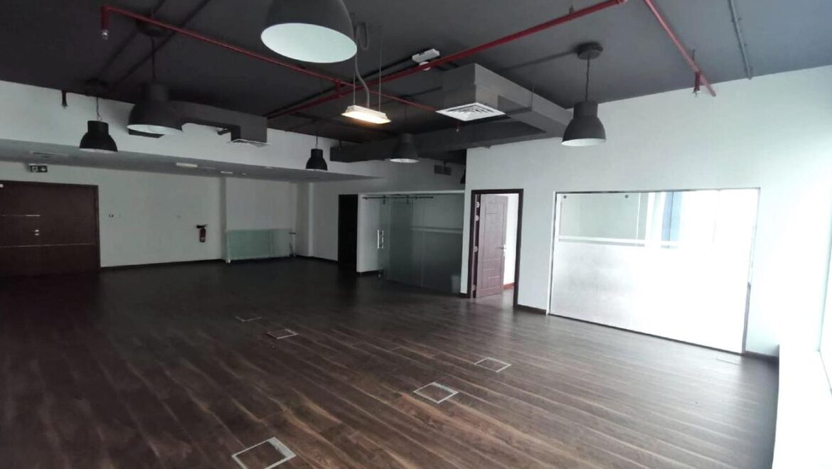 Bedroom-style office interior at Al Manara Tower, Business Bay, Dubai, featuring a modern desk, seating, and contemporary decor-Propertyana real estate in dubai and sharjeh