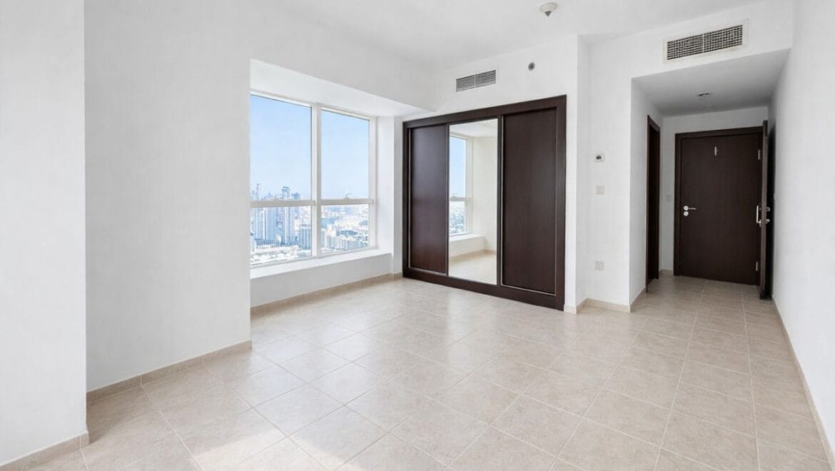 Bright, modern 2-bedroom apartment interior in Elite Residence, Dubai Marina, Dubai, featuring contemporary furnishings and large windows.-Propertyana real estate in dubai and sharjeh