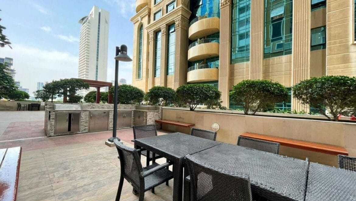 Bright, modern 2-bedroom apartment interior in Elite Residence, Dubai Marina, Dubai, featuring contemporary furnishings and large windows.-Propertyana real estate in dubai and sharjeh