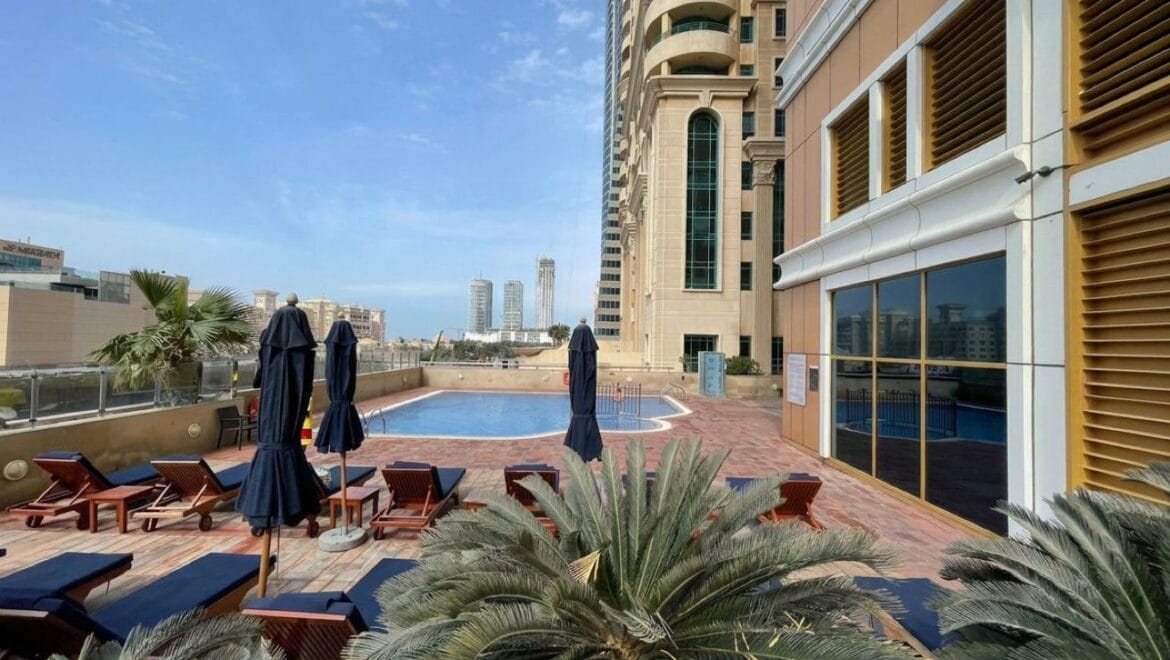 Bright, modern 2-bedroom apartment interior in Elite Residence, Dubai Marina, Dubai, featuring contemporary furnishings and large windows.-Propertyana real estate in dubai and sharjeh